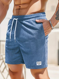 Shorts décontractés pour hommes avec taille élastique, cordon ajustable et tissu texturé