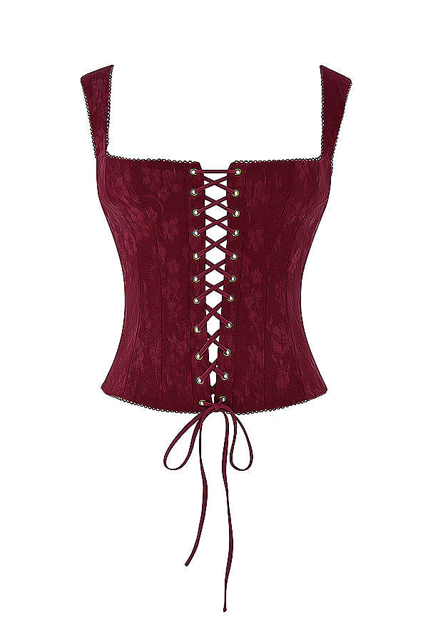 Élégant top corset à lacets pour femme, de couleur merlot, pour un look sophistiqué.