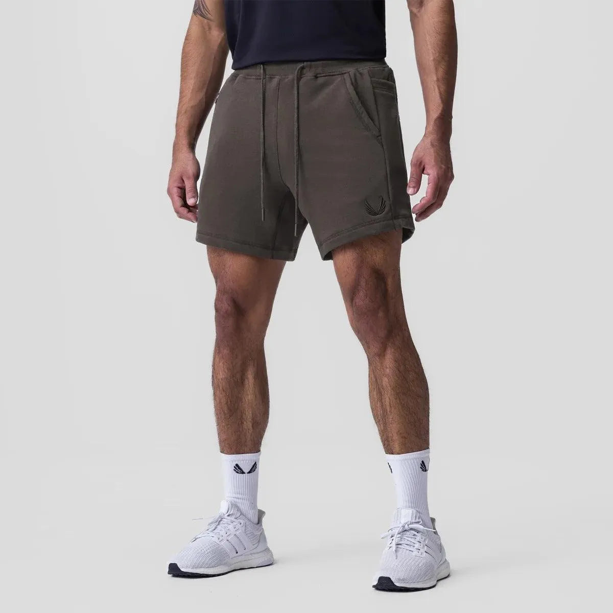 Shorts pour hommes ultra respirants avec taille élastique et poches latérales - Parfait pour sport et détente