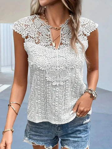 Top en dentelle aux détails raffinés - blouse élégante pour femme aux motifs complexes