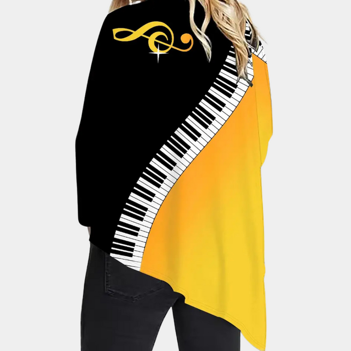 Élégant chemisier cape pour femmes - élégant haut noir et jaune avec un magnifique motif de piano