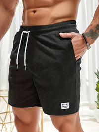Shorts décontractés pour hommes avec taille élastique, cordon ajustable et tissu texturé