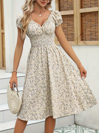 Robe midi d'été florale à manches bouffantes pour femmes