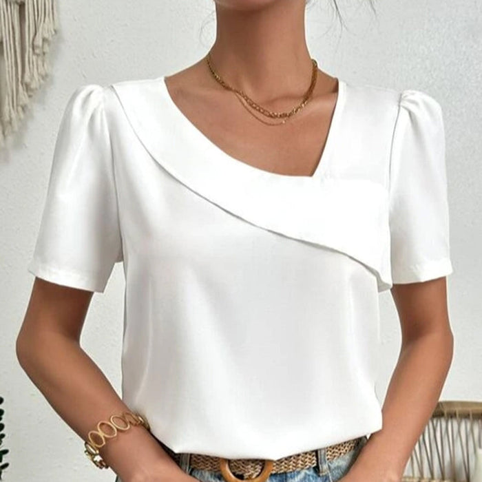 Top asymétrique à manches courtes pour femmes - manches bouffantes blanches à la mode pour un look chic et décontracté