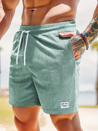 Shorts décontractés pour hommes avec taille élastique, cordon ajustable et tissu texturé