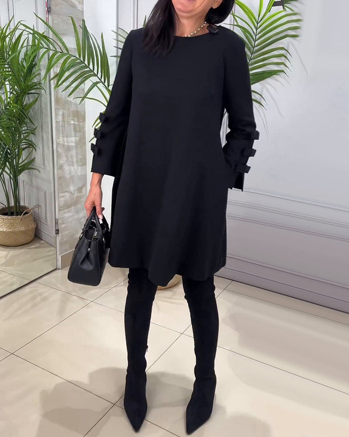Robe Femme Élégante à Coupe A, Manches Longues avec Détail Nœud, Longueur Genoux et Col Rond