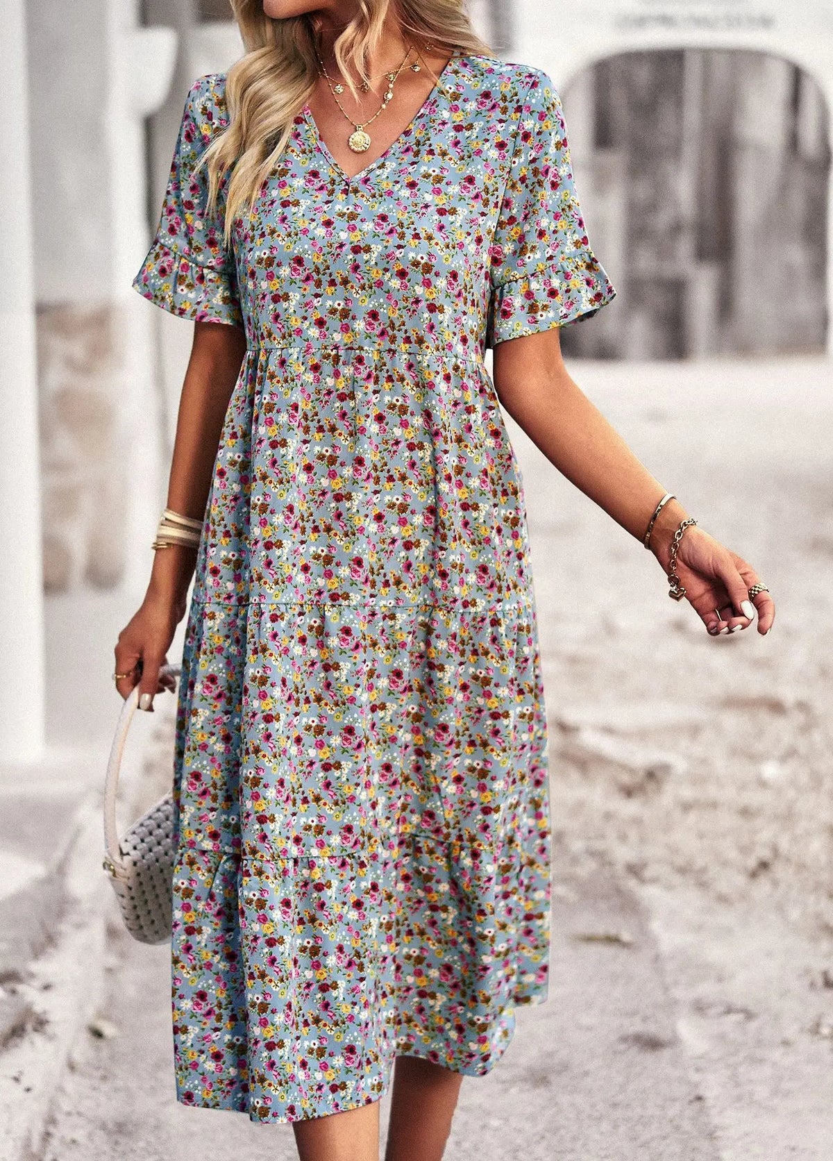 Élégant manteau de kurzarm imprimé floral avec une écharpe en V en tissu léger