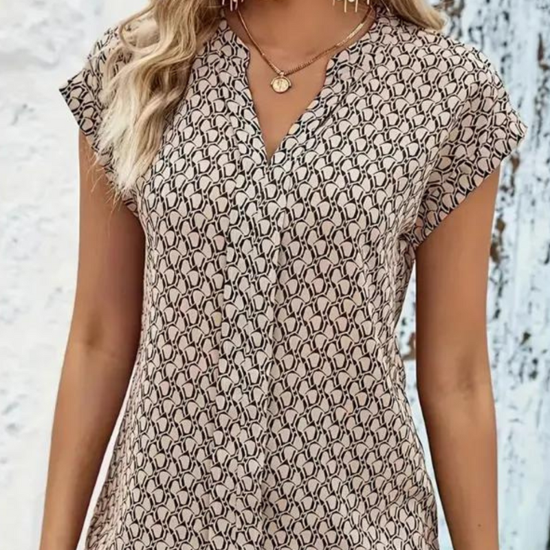 Bernice - T-shirt tendance à col en V avec motif géométrique stylisé et manches courtes
