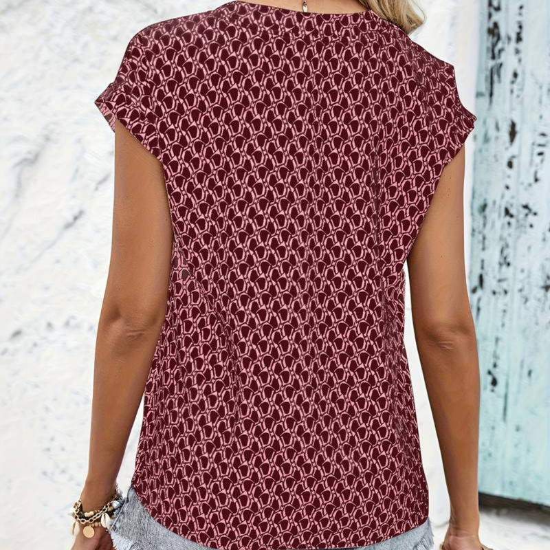 Bernice - T-shirt tendance à col en V avec motif géométrique stylisé et manches courtes