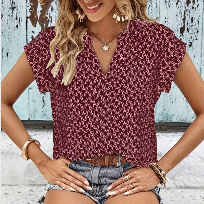 Bernice - T-shirt tendance à col en V avec motif géométrique stylisé et manches courtes