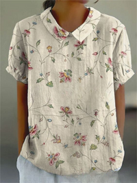 Elégant top pour femmes avec de belles broderies florales - manches courtes élégantes pour un look décontracté