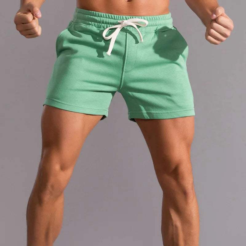 Short décontracté pour hommes avec taille élastique, tissu en coton respirant, coupe ajustable et poches latérales pratiques