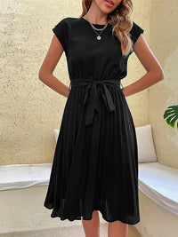 Élégante robe plissée à manches courtes pour un look stylé