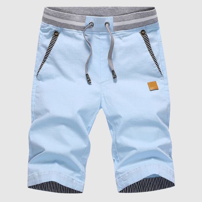 Shorts décontractés pour hommes avec cordon à la taille, poches zippées et coupe ample jusqu'au genou