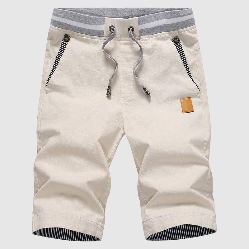 Shorts décontractés pour hommes avec cordon à la taille, poches zippées et coupe ample jusqu'au genou