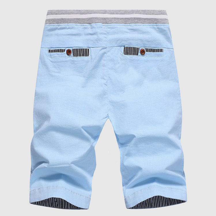 Shorts décontractés pour hommes avec cordon à la taille, poches zippées et coupe ample jusqu'au genou
