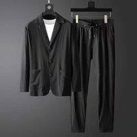 Costume décontracté élégant pour hommes - Blazer ajusté et pantalon de jogging avec tissu texturé et fermeture à 3 boutons