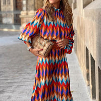 Robe midi élégante Keira à imprimé coloré - Parfaite pour toutes les occasions