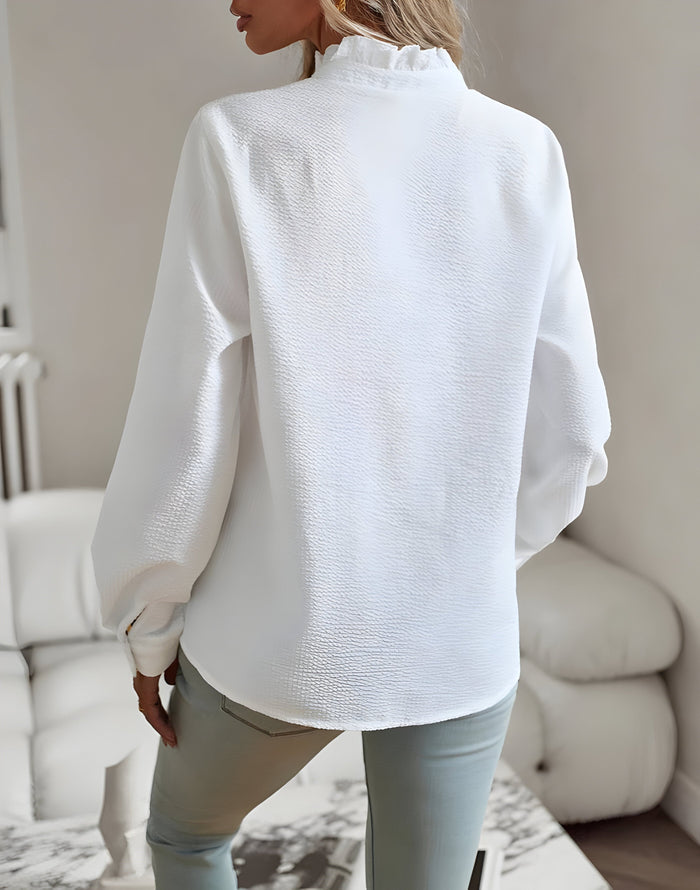 Élégante blouse rayée pour femme avec boutons pour un look élégant
