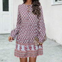 Vestido midi boho para mujer con corte fluido, manga larga y escote en forma de llave con estampado elegante