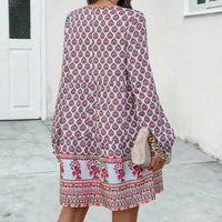 Vestido midi boho para mujer con corte fluido, manga larga y escote en forma de llave con estampado elegante
