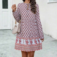 Vestido midi boho para mujer con corte fluido, manga larga y escote en forma de llave con estampado elegante