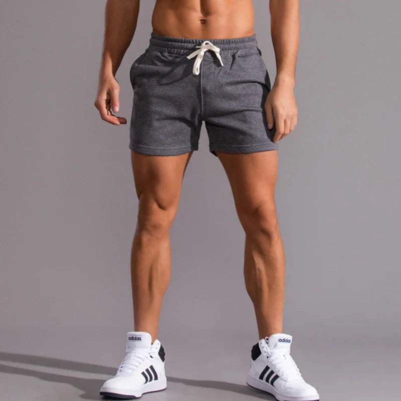 Short décontracté pour hommes avec taille élastique, tissu en coton respirant, coupe ajustable et poches latérales pratiques