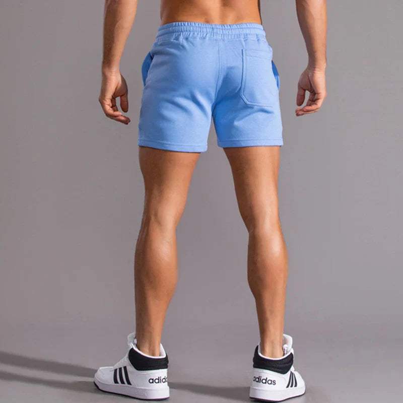 Short décontracté pour hommes avec taille élastique, tissu en coton respirant, coupe ajustable et poches latérales pratiques