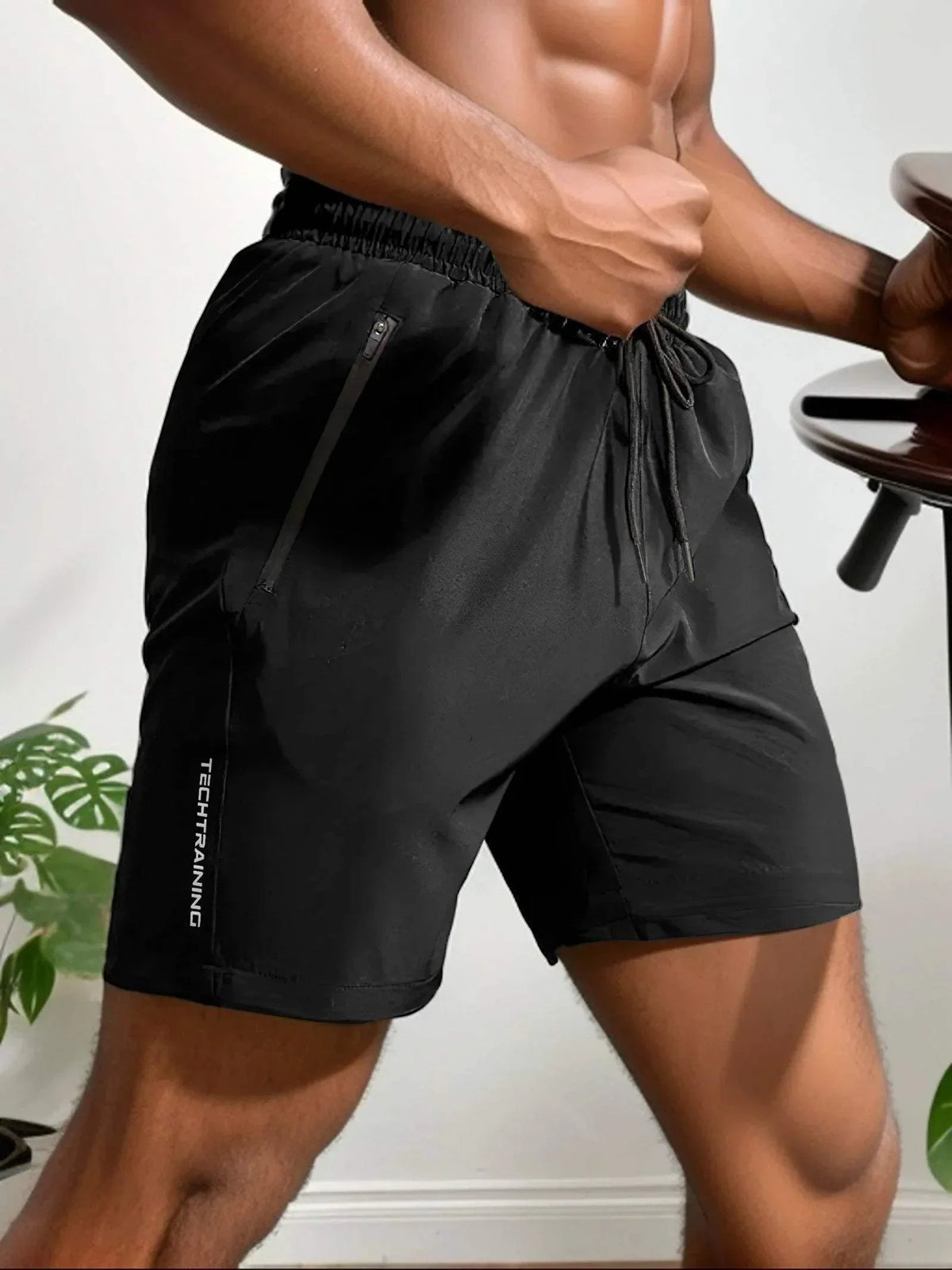 Shorts de sport pour hommes - Tissu léger et Absorbant - Flexibles et avec poche zippée