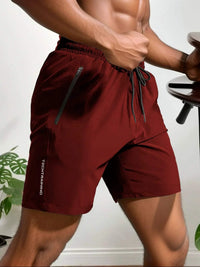 Shorts de sport pour hommes - Tissu léger et Absorbant - Flexibles et avec poche zippée