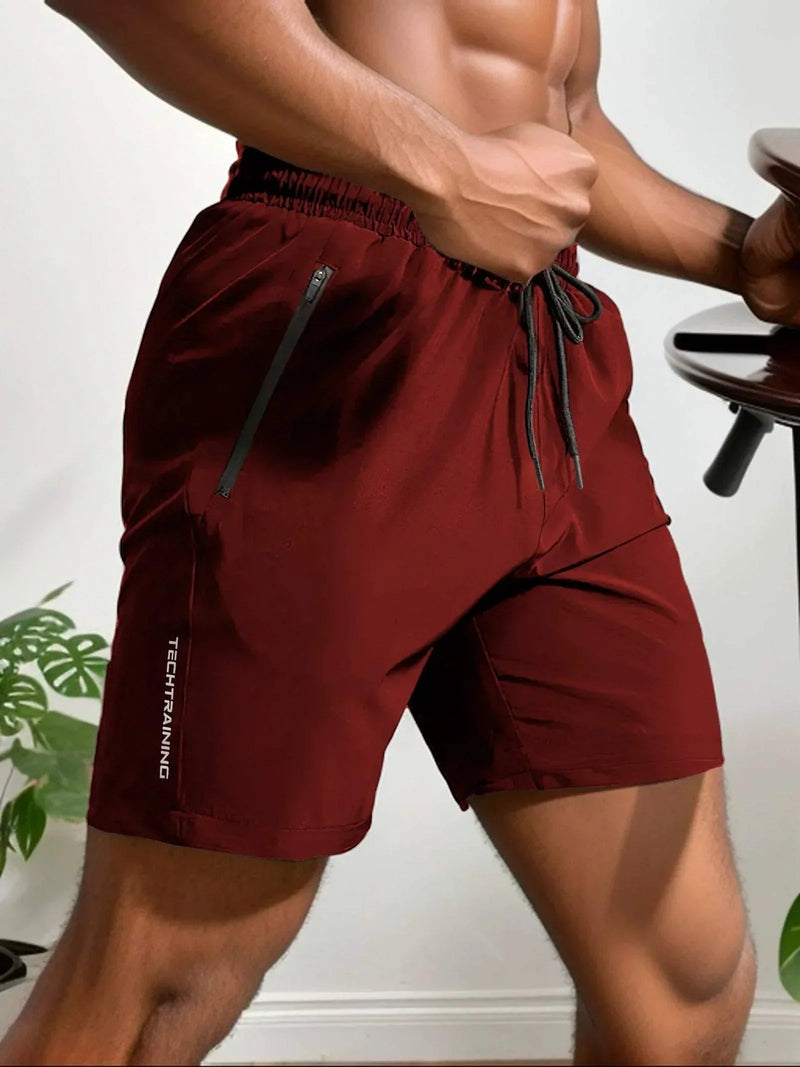 Shorts de sport pour hommes - Tissu léger et Absorbant - Flexibles et avec poche zippée