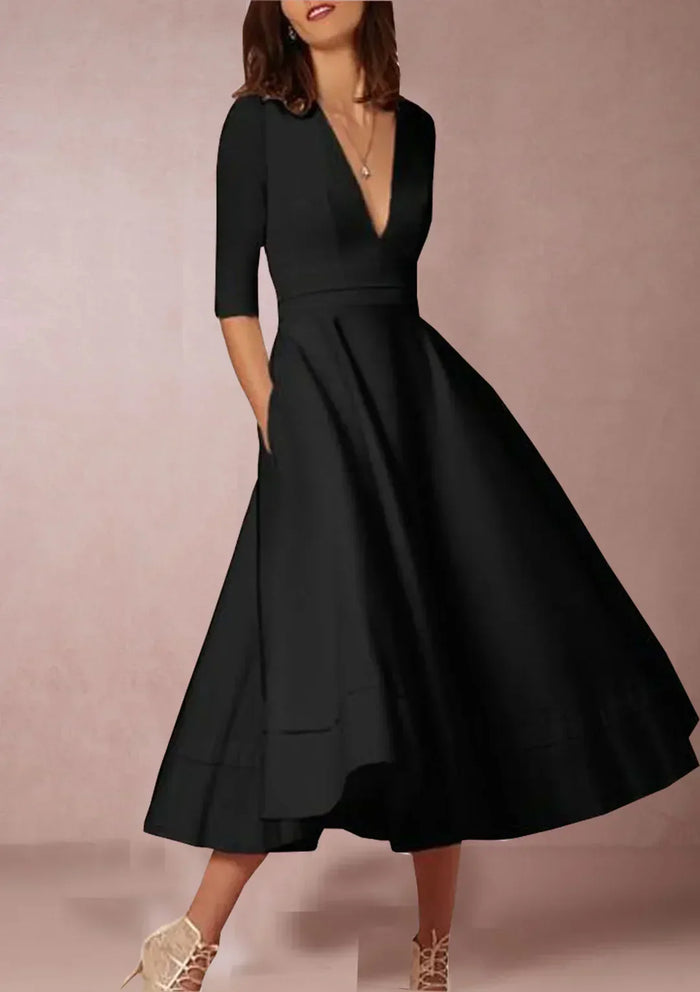 Robe midi élégante avec décolleté en V et jupe volumineuse pour un look élégant.