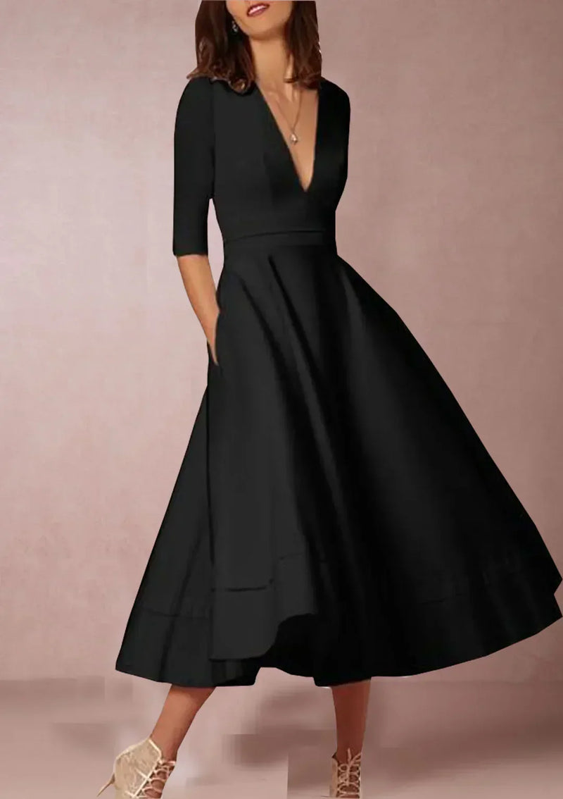 Robe midi élégante avec décolleté en V et jupe volumineuse pour un look élégant.