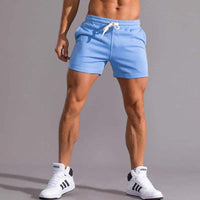 Short décontracté pour hommes avec taille élastique, tissu en coton respirant, coupe ajustable et poches latérales pratiques