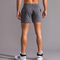 Short décontracté pour hommes avec taille élastique, tissu en coton respirant, coupe ajustable et poches latérales pratiques