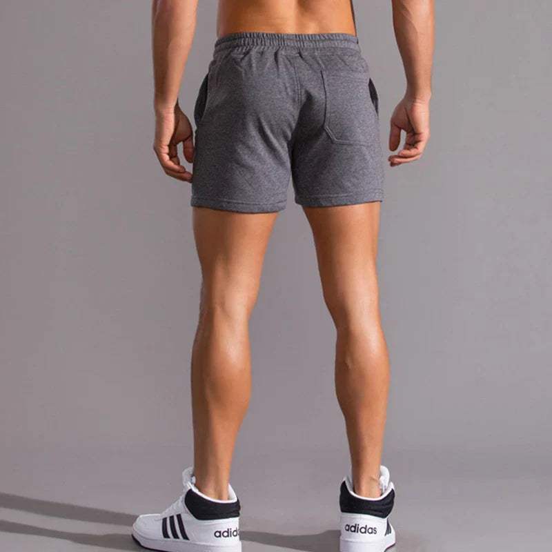 Short décontracté pour hommes avec taille élastique, tissu en coton respirant, coupe ajustable et poches latérales pratiques