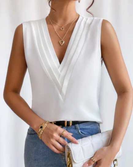 Elégant top blanc sans manches à col en V pour un look rafraîchissant et stylé