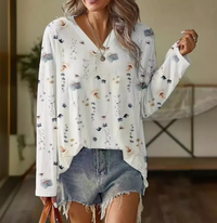 Élégant t-shirt à manches longues pour femmes avec imprimé floral blanc pour un look élégant