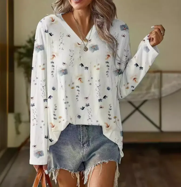 Élégant t-shirt à manches longues pour femmes avec imprimé floral blanc pour un look élégant