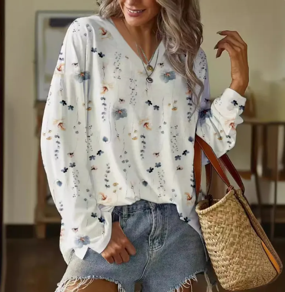 Élégant t-shirt à manches longues pour femmes avec imprimé floral blanc pour un look élégant