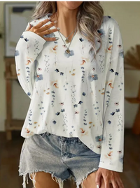 Élégant t-shirt à manches longues pour femmes avec imprimé floral blanc pour un look élégant