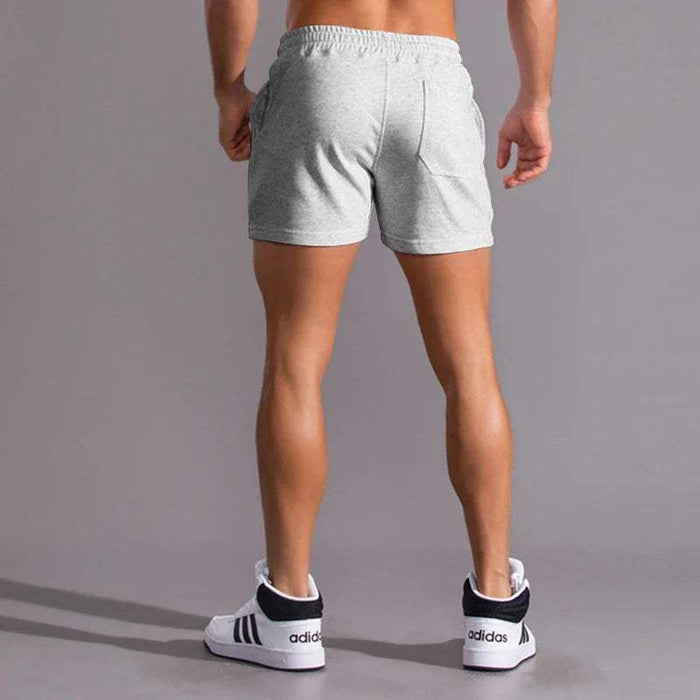 Short décontracté pour hommes avec taille élastique, tissu en coton respirant, coupe ajustable et poches latérales pratiques