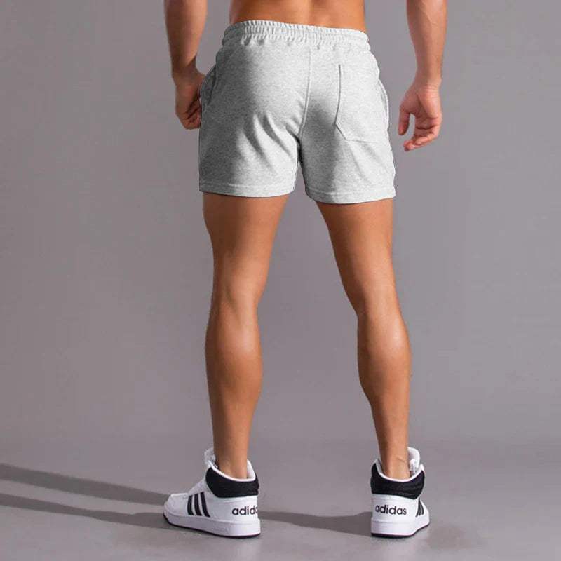Short décontracté pour hommes avec taille élastique, tissu en coton respirant, coupe ajustable et poches latérales pratiques