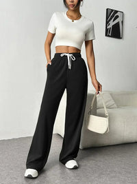 Pantalon de survêtement à jambes larges pour femmes - confort et style ultimes avec un tissu doux et extensible pour une journée décontractée et à la mode