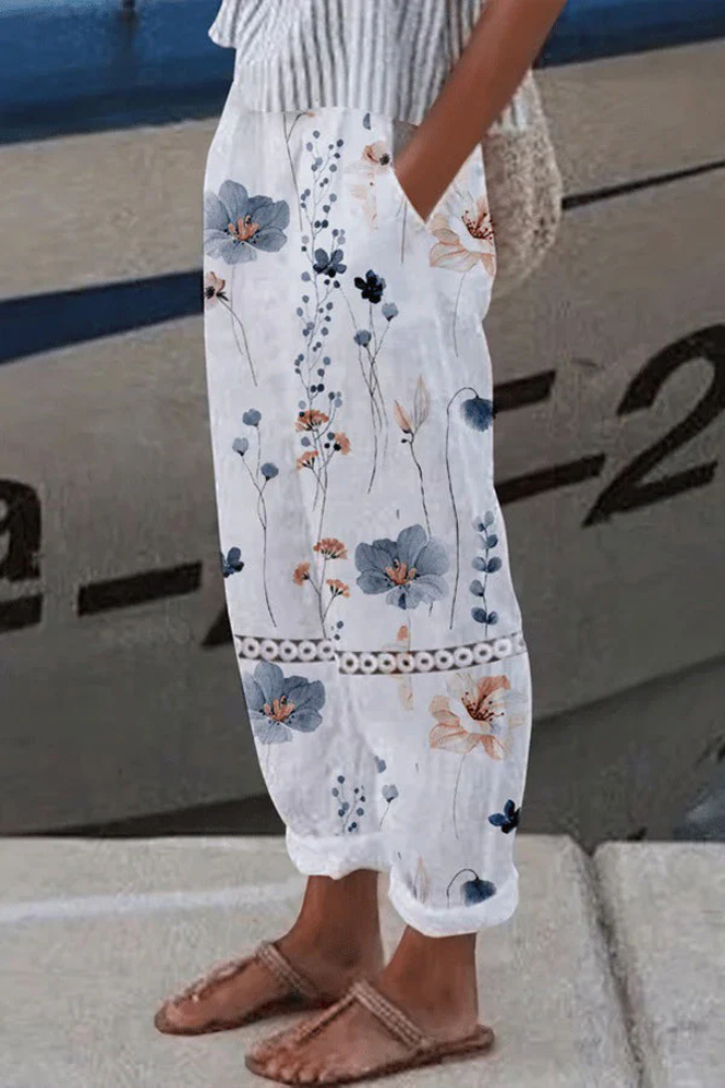 Élégant pantalon décontracté pour femmes avec un imprimé floral accrocheur - un vêtement d'intérieur confortable et aéré pour tous les jours