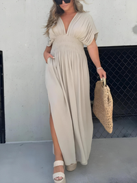 Robe longue élégante avec fente stylée et décolleté en V pour un look enchanteur