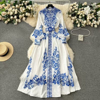 Robe chemise midi élégante à ceinture imprimée, parfaite pour un style chic et décontracté en toute saison