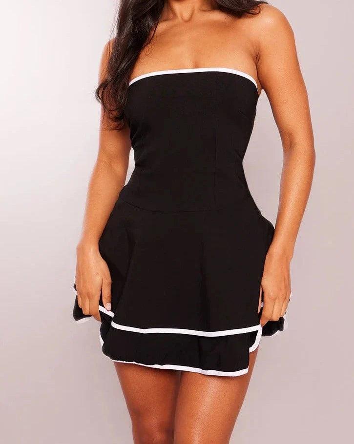 Chandail chic à contraste pour femmes, avec des ailerons modernes en forme d'écharpe.