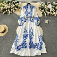 Robe chemise midi élégante à ceinture imprimée, parfaite pour un style chic et décontracté en toute saison