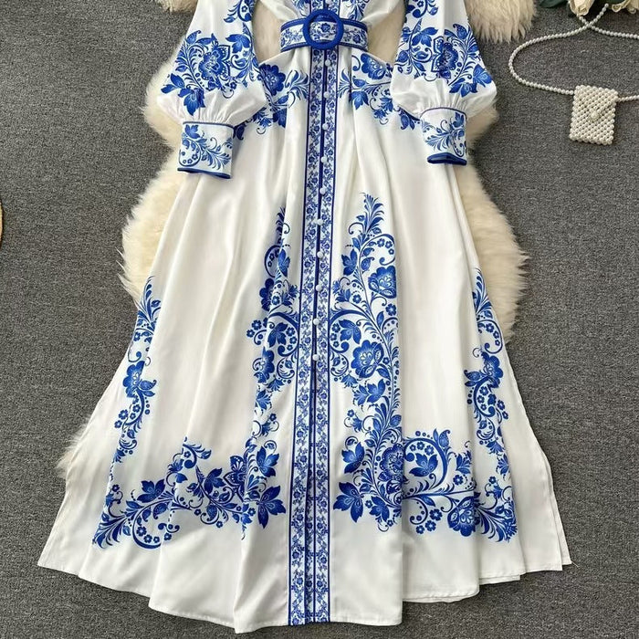 Robe chemise midi élégante à ceinture imprimée, parfaite pour un style chic et décontracté en toute saison